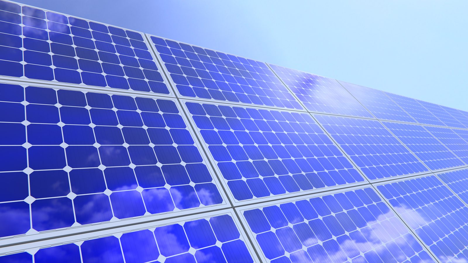 Blue polycrystalline solar panels against the sky