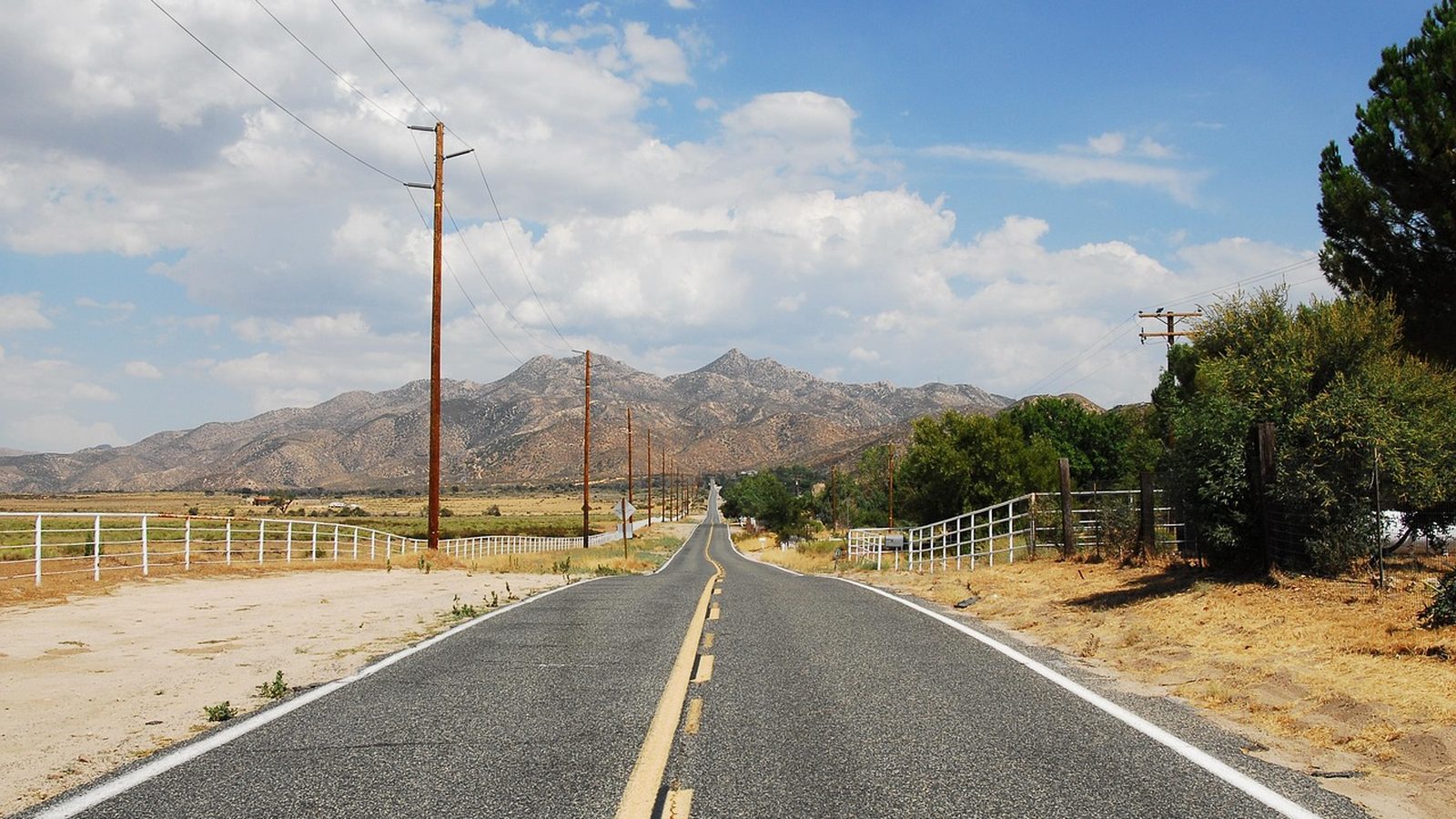 A country road under open High Desert sky in Hesperia, California