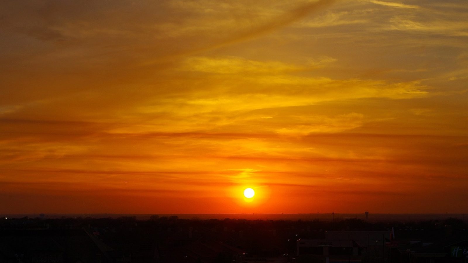 Orange sunset sky over Plano, Texas