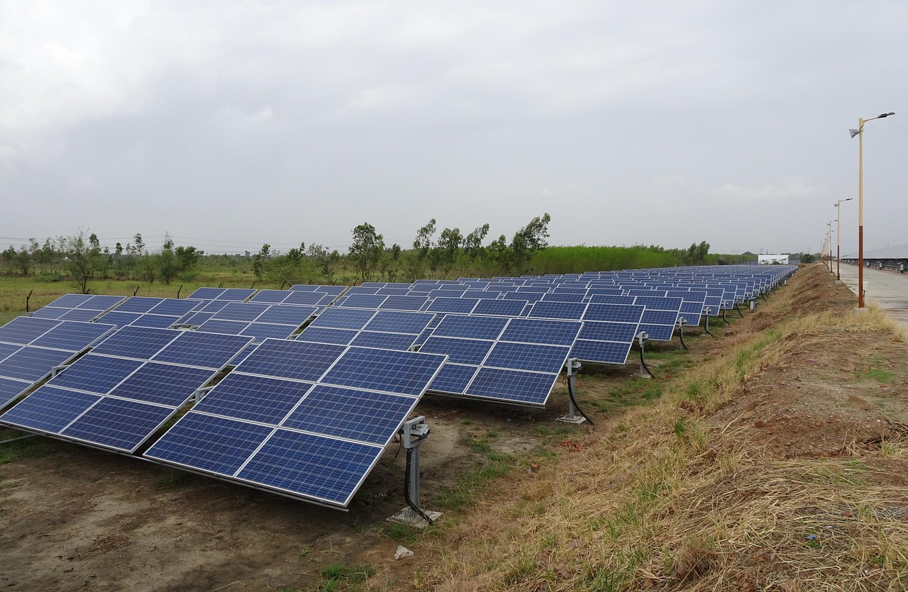 Solar panels beside a waterway
